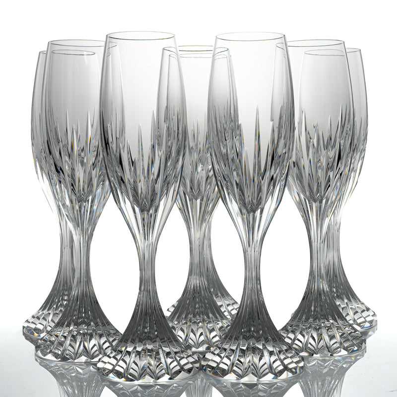 Eight Baccarat Massena champagne flutes in clear cut crystal, grouped together