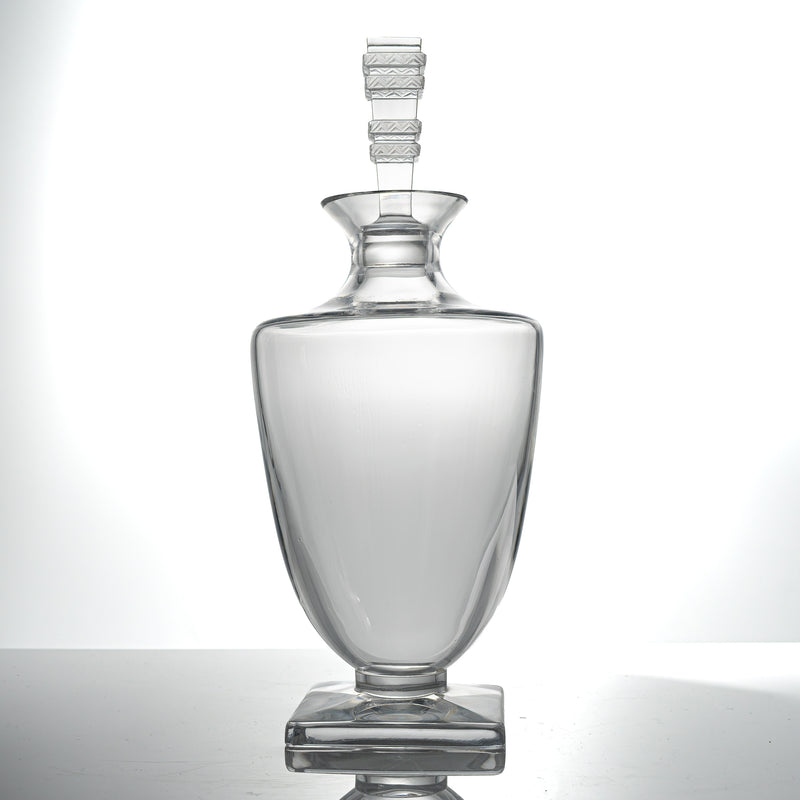 Lalique Argos crystal decanter with its tall stopper, standing upright on its square base