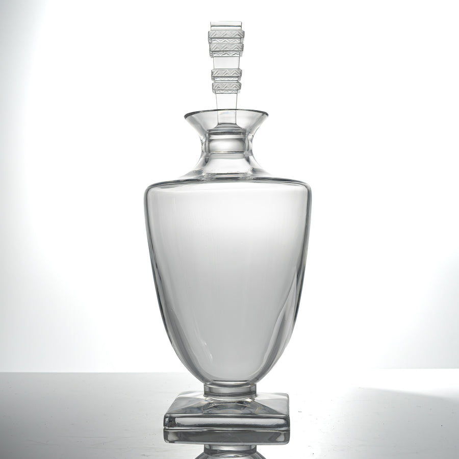 Lalique Argos crystal decanter with its tall stopper, standing upright on its square base
