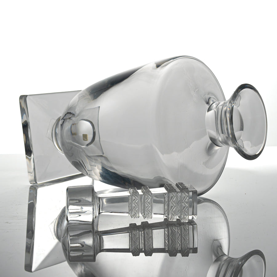 Lalique Argos decanter lying on its side beside its stopper