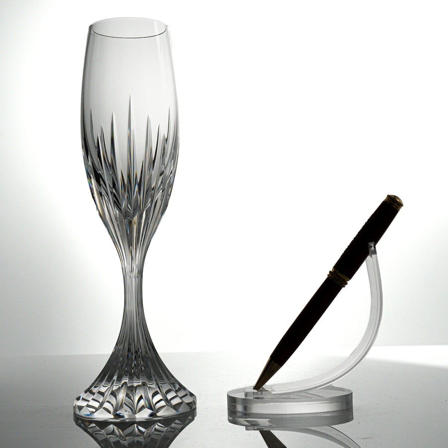 Baccarat Massena champagne flute beside a pen on a stand, for scale