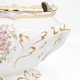 Spode Chelsea Bird large covered tureen side view of a gilt-tipped handle and the rim notch