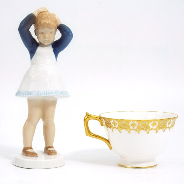 bing and grondahl 1960s Vintage Porcelain Figurine Bing & Grøndahl Anne Girl Doing Her Hair Figurine #2381 | Danish Statue Nursery Mussel Cobalt Scandi - Porcelain Figurine ClassyTea