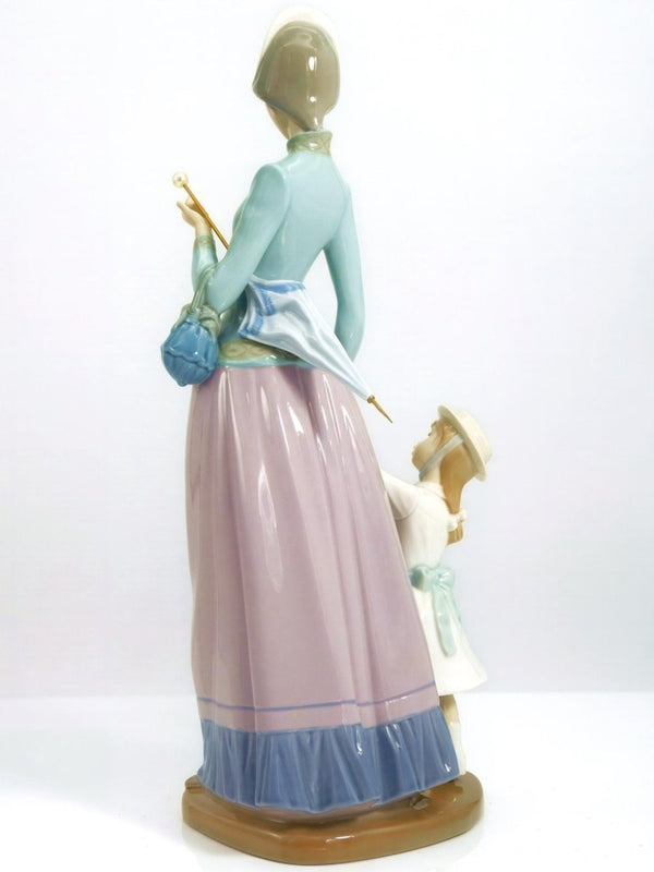 Lladro Large Lladro Porcelain Figurine Lady Walking with Girl 1353 | Mothers Day Gift for Wedding gift from aunt Graduation gift from mom Cabinet - Porcelain Figurine ClassyTea