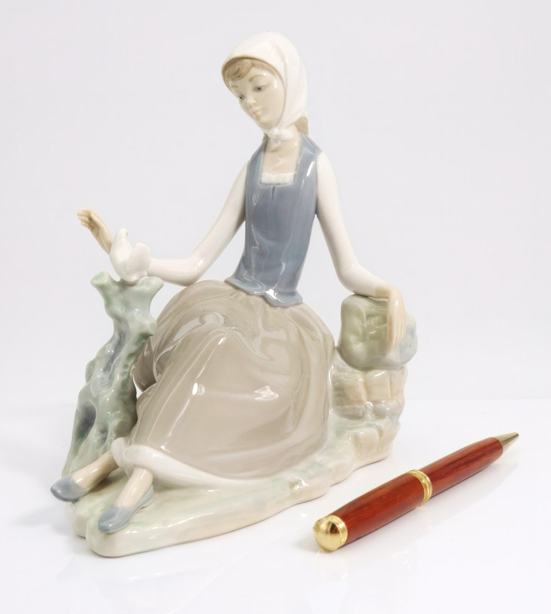 Lladro Lladro Shepherdess and Dove #4660 Porcelain Figurine Vintage romantic curio cabinet nursery unique shelf decor bird lover Statue Sculpture - Porcelain Figurine ClassyTea