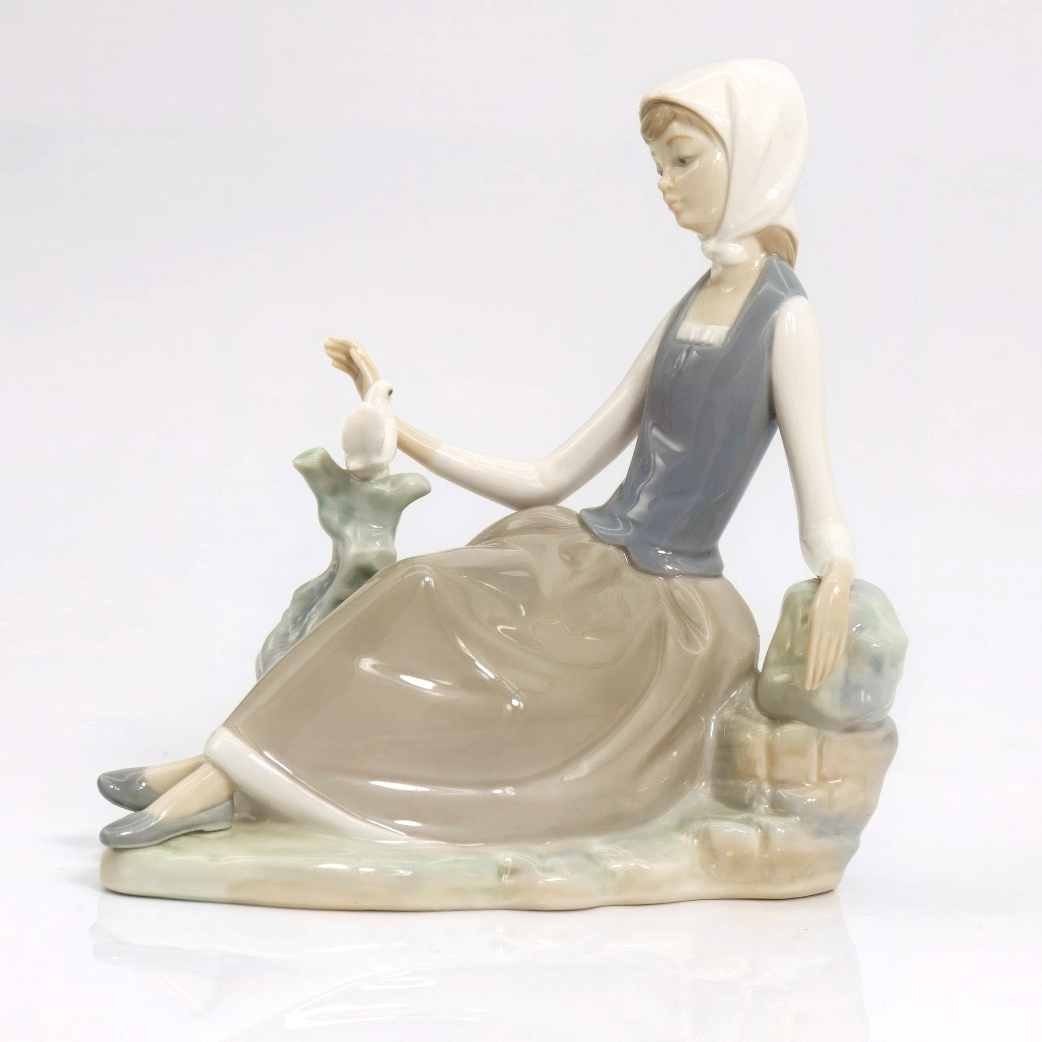 Lladro Lladro Shepherdess and Dove #4660 Porcelain Figurine Vintage romantic curio cabinet nursery unique shelf decor bird lover Statue Sculpture - Porcelain Figurine ClassyTea